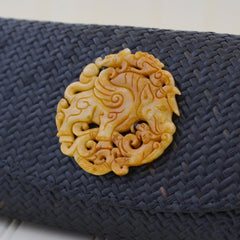 Black Rattan and Snake Skin Clutch with Soapstone Medallion (Tan Medallion)