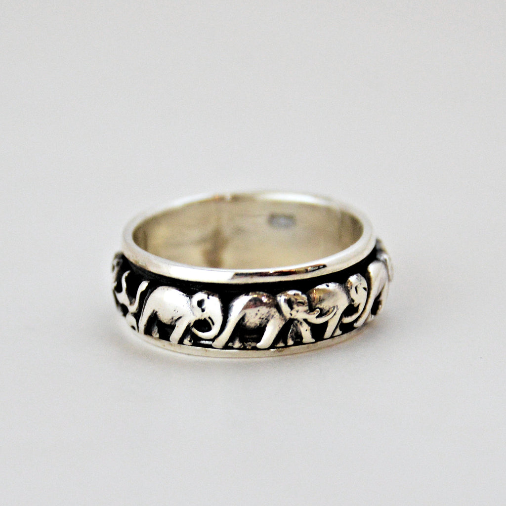 Spinning Band of Elephants Ring