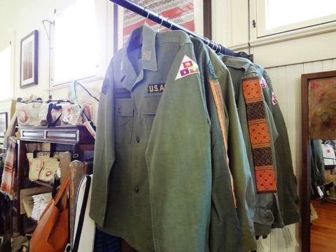 The Elephant Story sells army fatigue jackets enhanced with colorful, hand woven Asian fabrics.