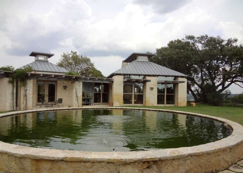 San Antonio's Lake | Flato Architects designed the Storys’ home, a series of pods surrounding a central pool, on a ranch near Center Point.