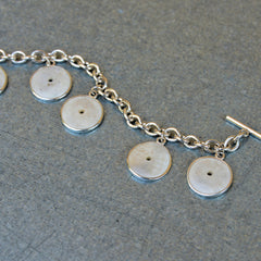 5 Silver Bound Conch Shell Charm Bracelet