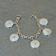 5 Silver Bound Conch Shell Charm Bracelet